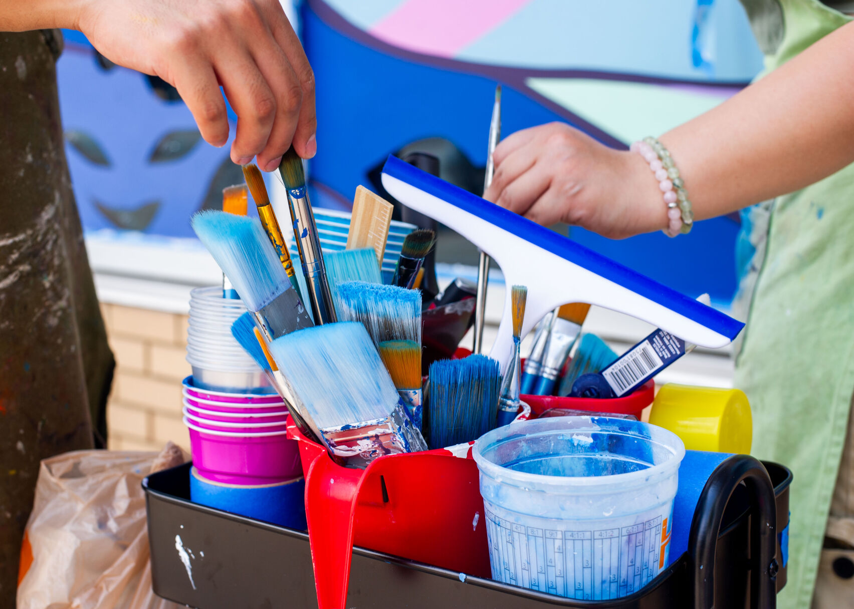 Artist paints new mural at Entrepreneurship and Technology Development Center
